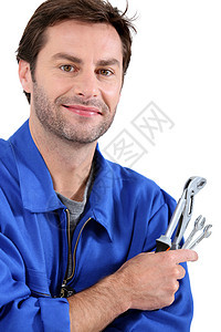 管道头发工作室建设者男人男性扳手工具白色微笑棕色图片