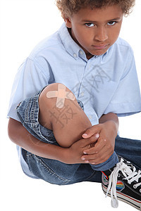 一个小男孩的肖像童年血统卷曲孩子哭泣工作室疼痛伤口黑发划痕图片
