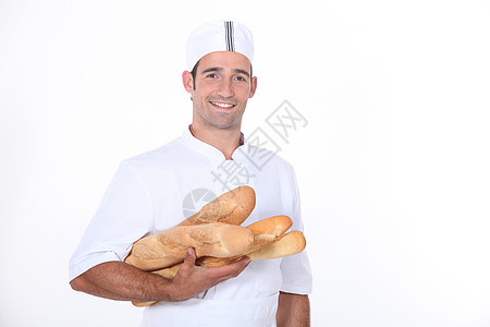 带袋式面包盘的贝克男人工艺食堂厨房职业展示顾客炊具食物加热器图片