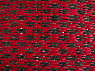 红色和黑色垫子的纹理工艺帆布线条竹子地面编织地板稻草粮食小地毯图片