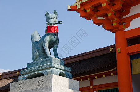 京都神社的福克斯雕像神社橙子宗教围裙传统石头旅游监护人建筑学建筑图片