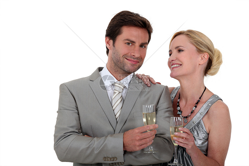 夫妇与香槟头发派对周年金发妻子套装生日拥抱纪念日丈夫图片