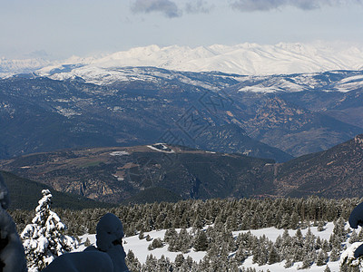 下雪山旅行蓝色风景荒野地块冻结远足顶峰滑雪爬坡图片