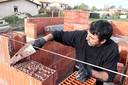 Bricklayer 盖一栋房子瓦工职员建筑工人工作石工住房手套建设者工具图片