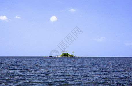 被遗弃的热带岛屿太阳海洋海岸天空情调海滩蓝色风景海浪异国图片