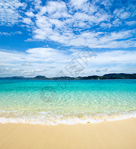 热带海洋阳光放松海岸假期晴天太阳冲浪蓝色海浪旅行图片