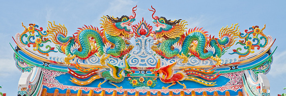 Jos家屋顶上的龙形状态节日动物文化力量艺术财富宗教金子传统装饰品图片