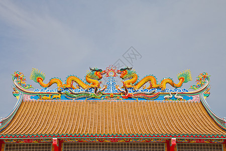 Jos家屋顶上的龙形状态动物文化雕像寺庙财富艺术力量传统装饰品金子图片