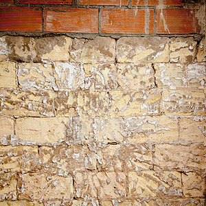 修复砖墙的废碎砖墙建筑石膏水泥拼装风化接缝工作乡村房子衰变图片