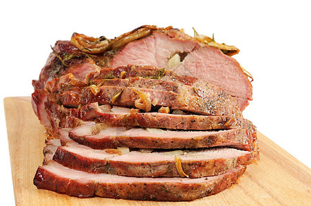 木板上的烤猪肉牛扒烧烤炙烤猪肉烹饪晚餐美食红色食物图片