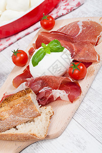 意大利莫扎里拉火腿绿色小吃盘子食物红色饮食奶制品营养白色图片