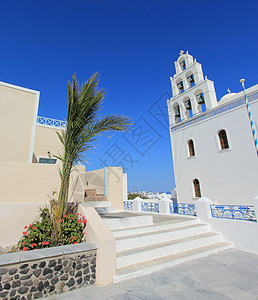 希腊圣托里尼奥亚教会棕榈旅游宗教蓝色旗帜村庄旅行楼梯圆顶火山口图片