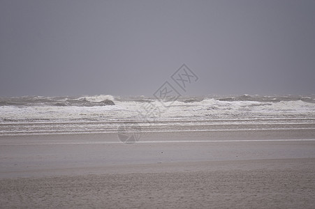 暴风暴洪水海岸波浪泥滩海浪断路器风暴潮地平线暴风雨天空冲浪图片