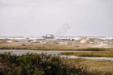 暴风暴洪水海浪沙丘建筑断路器暴风雨天气糕点地平线灯光波浪图片