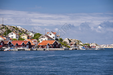 瑞典Roennaeng房子岛屿钓鱼码头渔村木屋蓝色岩石船屋群岛图片