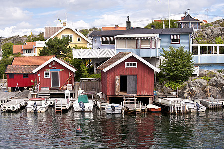 瑞典Roennaeng房屋海岸码头群岛花岗岩蓝色沿海木屋港口钓鱼图片