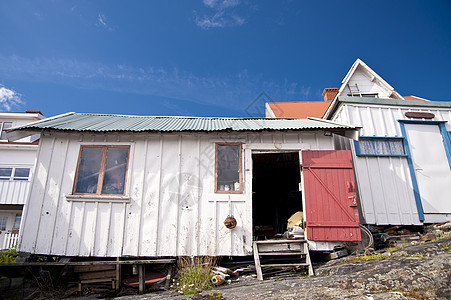 瑞典阿斯托尔天空船库港口海岸渔港木屋渔夫岛屿船屋牧歌图片