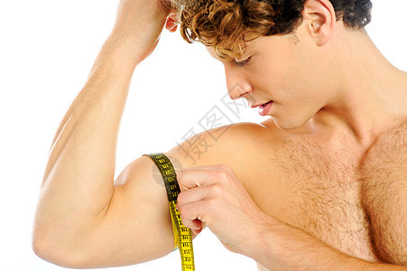 帅哥量他的二头肌膀子健身房数字男人活力磁带冒充仪表肌肉节食图片