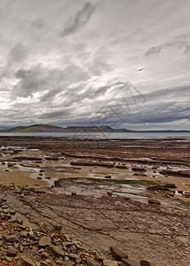 Jurassic海岸线 Lyme Regis Dorset天空运动化石戏剧性码头目的地悬崖旅游天气侏罗纪图片