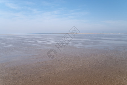 海滩沙滩天空泥滩海岸地平线季节图片