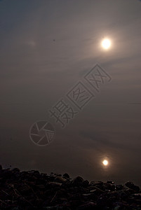 海滩沙滩灯光天空镜子日落泥滩海岸太阳地平线季节图片