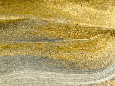 迭层沙石沉积岩平滑表面结晶材料图层圆形水晶沉积石头石英棕色夹杂物图片