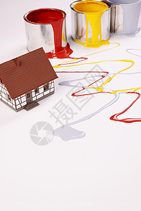 绘画概念白色黄色画家装潢房子工作室液体染料刷子画笔图片