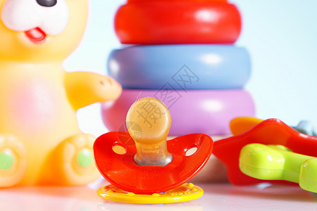 婴儿玩具出牙期蓝色黄色奶嘴童年圆形塑料戒指新生绿色图片