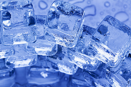 蓝色背景的冰雪立方体冰箱寒冷冰块水晶水滴寒意图片