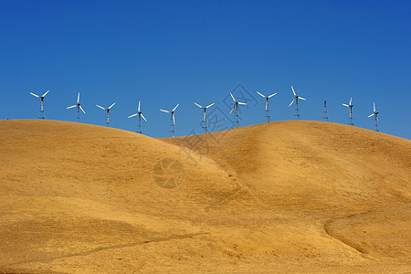 风电三角形爬坡乡村蓝色发电机天空黄色涡轮背景图片