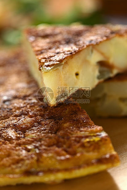 西班牙语 Tortilla 煎蛋卷营养美食盘子油炸土豆午餐洋葱早餐小吃食物图片