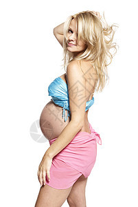 孕妇的肖像家长肚子准妈妈影棚腹部头发粉色女人人类新生活图片