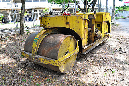 黄黄蒸汽机卡车建筑机械压力滚筒振动工作车辆街道维修图片