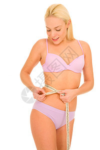 女人用带子测量腰部内衣长发年轻人内裤乳罩金发女郎胸罩成人短裤身体图片