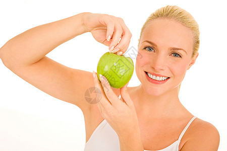 拥有绿苹果的妇女年轻人女士金发女郎成人水果健康饮食饮料头发金发食物图片