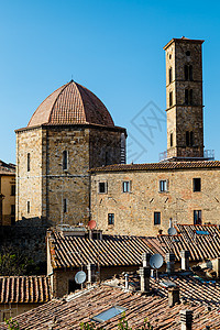 意大利托斯卡纳的伏尔特拉小城日落家园村庄砖块圆顶石头大教堂天空正方形旅行蓝色图片