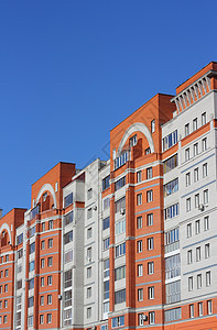 人居住的高楼对着蓝天住房天空窗户商业城市摩天大楼房子生活阳光公寓图片
