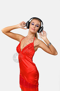 青年妇女戴耳机的肖像成人技术女孩闲暇音乐娱乐喜悦乐趣快乐女士图片