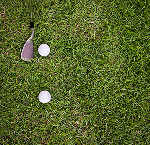 草地上的高尔夫球和铁竞赛游戏绿色空白运动俱乐部圆形爱好曲线圆圈图片
