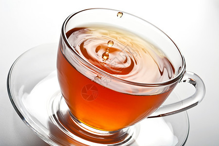茶叶在玻璃杯中泼花饮料补品草本植物餐厅水滴咖啡店玻璃气泡早餐芳香图片
