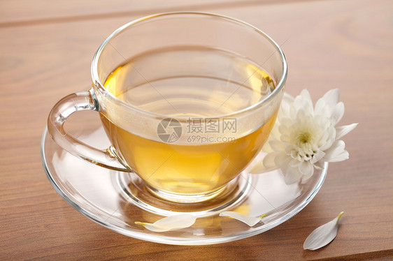 绿茶和白花飞碟植物早餐美食花瓣玻璃芳香饮料叶子补品图片