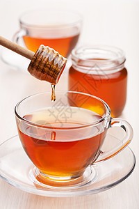 茶加蜂蜜瓶子草本植物玻璃橙子早餐蜂蜜餐厅糖浆芳香饮料图片