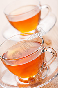 茶叶和甘蔗糖饮料香味黑色草本棕色玻璃早餐芳香勺子杯子图片