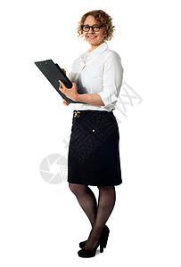 拥有文档文件夹的女商务人士图片
