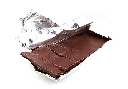 白色背景的破碎巧克力条牛奶巧克力美食糖果营养烹饪宏观小吃可可饮食图片