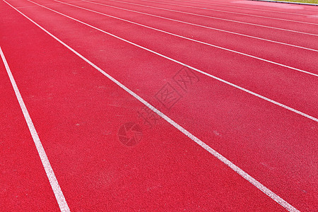 运动赛跑竞赛跑步红色积木车道白色运动员赛马场马场曲线图片