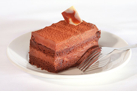 巧克力蛋糕糕点盘子甜点工作室巧克力棕色奶油白色食物图片