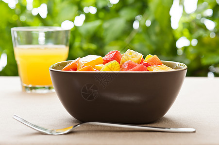 一碗混合热带水果沙拉早餐种子菠萝维生素午餐盘子宏观食物小吃西瓜图片