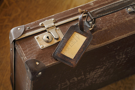 手提案乡愁旅行棕色标记标签行李高清图片