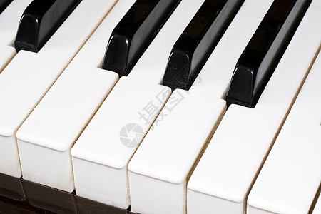 钢琴乐器黑色音乐工作室歌曲键盘旋律笔记白色宏观图片
